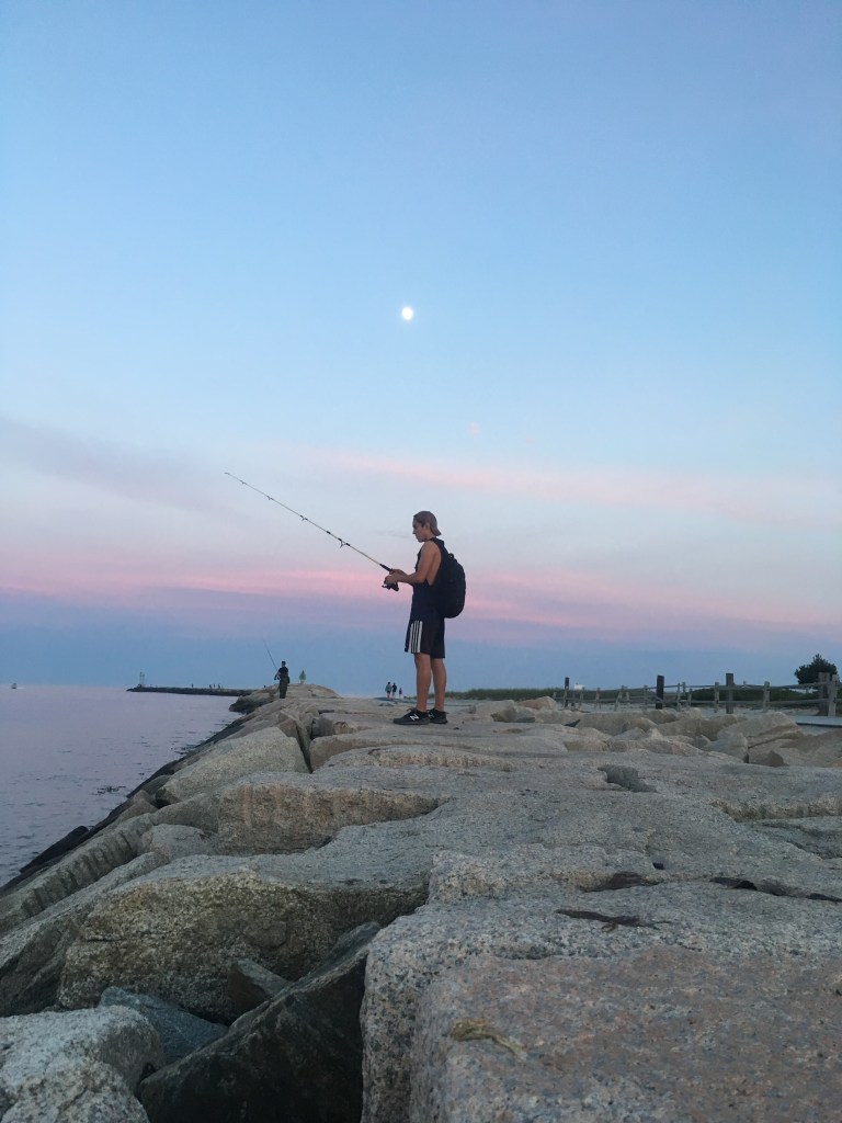 Brother fishing in Wells, Maine