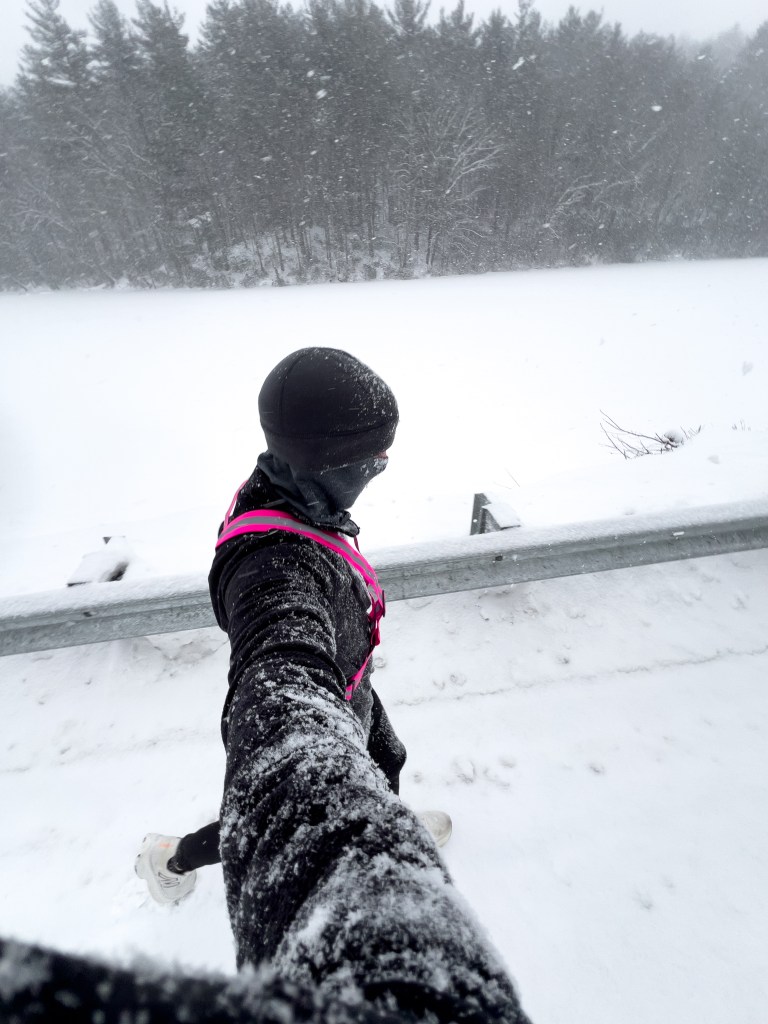 Author running in snowstorm