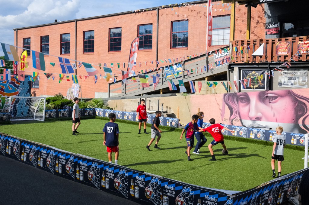 Kids playing soccer at Parkville Market in Hartford, CT.